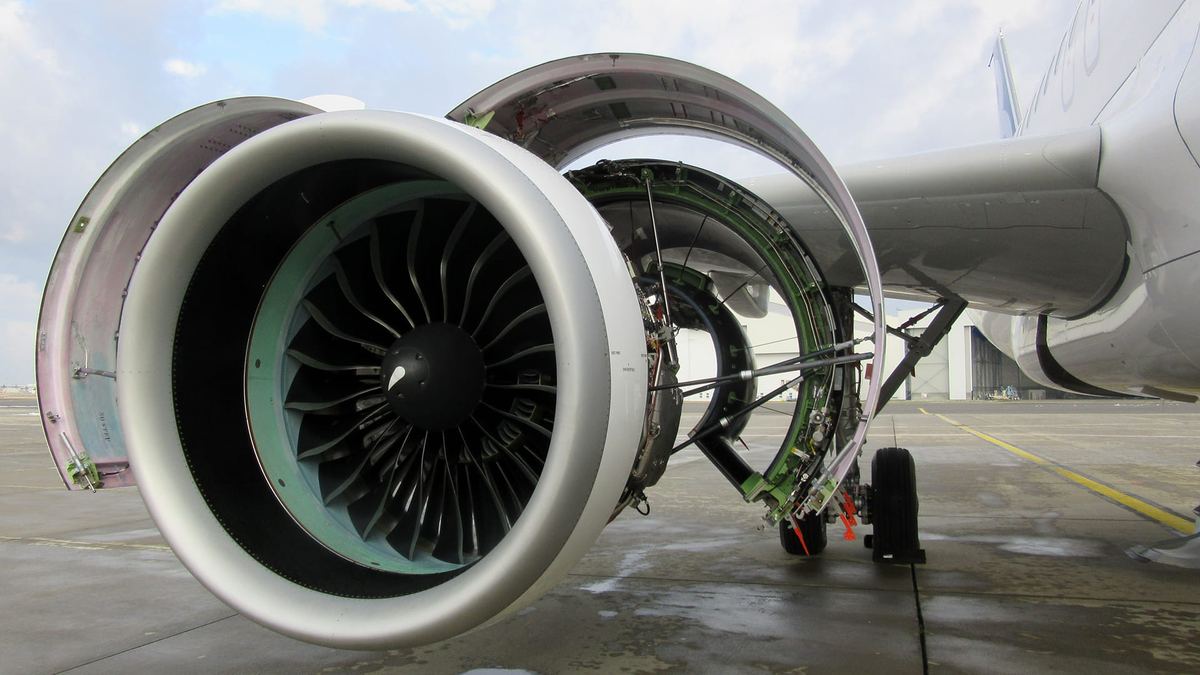 Open engine nacelle on an aircraft during a teardown